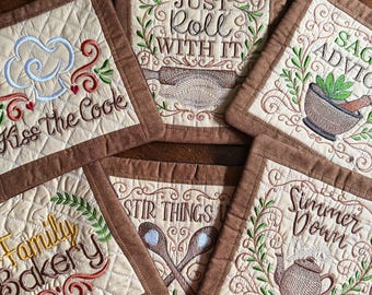 Kitchen Sayings Potholder/Trivets.  Approximately 8 inches square.  Quilted and Embroidered