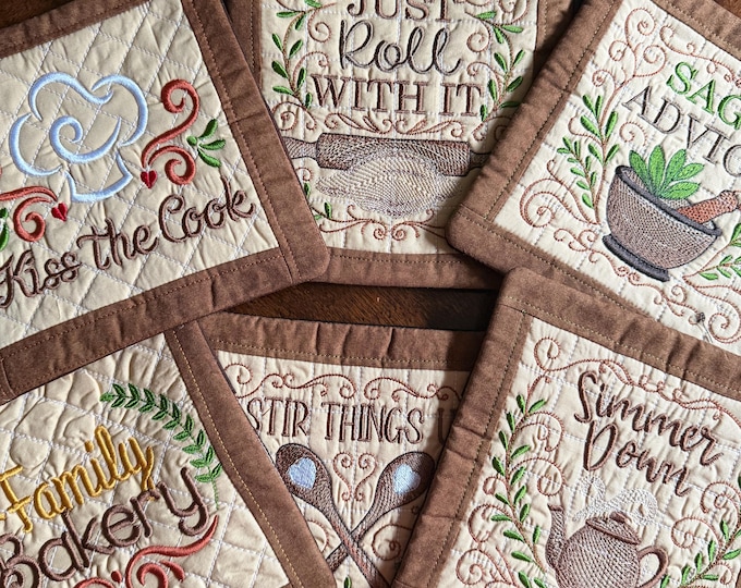 Kitchen Sayings Potholder/Trivets.  Approximately 8 inches square.  Quilted and Embroidered