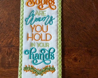 Dreams are Books You Hold Bookmark.  Embroidered.  Approximately 7 inches.