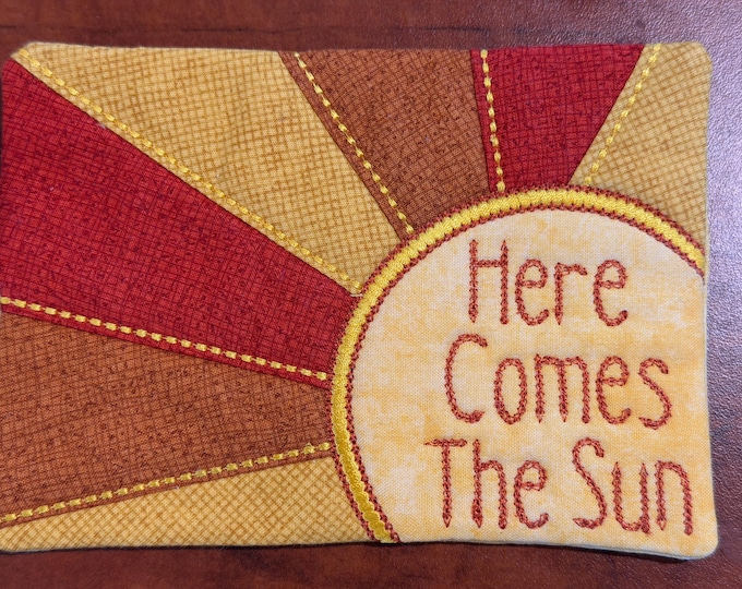 Embroidered Mug Rug Coaster: "Here Comes the Sun" Quilted Cotton.  5 x 7 inches