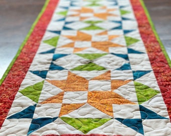 Table Runner, Batiks, Quilted.  Approximately:  51 x 16 inches.  Orange, Green and Blue