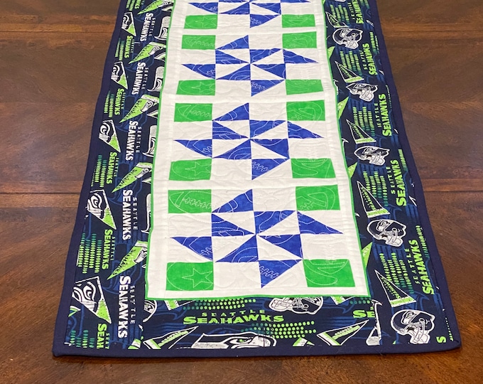 Seahawk Table Runner, 16 x 42 inches. Quilted and embroidered.
