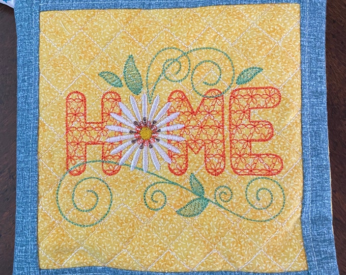 Daisy Home Potholder/Trivet.  Approximately 8 inches square.  Quilted and Embroidered