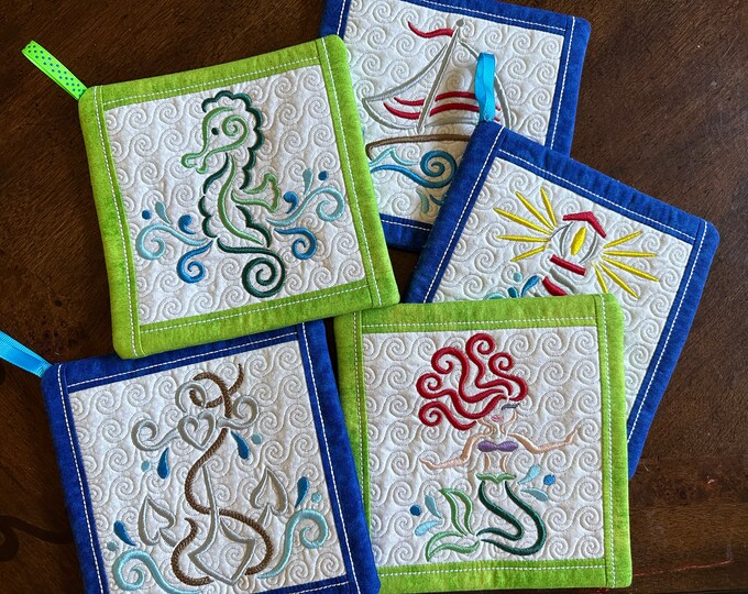 Nautical Pot Holder, Trivet, Hot Pad. Sailboat, Anchor, Lighthouse, Sea horse, Mermaid. 7.5 inches square.  Quilted and Embroidered.