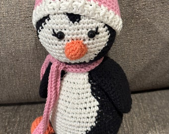 Penguin, Crocheted, Approximately 8 inches tall.  Dressed in a pink hat and scarf.