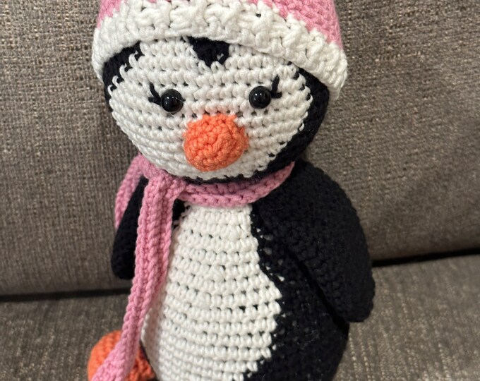 Penguin, Crocheted, Approximately 8 inches tall.  Dressed in a pink hat and scarf.