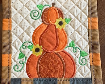 Triple Pumpkin, Hot Pad or Trivet, Approximately 7 1/2 inch square.  Embroidered and Quilted. Insulated Ready to Ship