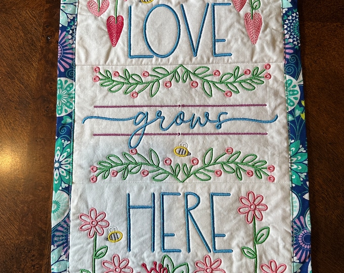 Wall Hanging, Love Grows Here.  2 sizes and color variations.  Quilted and Embroidered