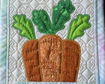 Easter Carrot Pot holder or Trivet.  Approximately 8 inches square.  Embroidered, Appliqued and quilted.