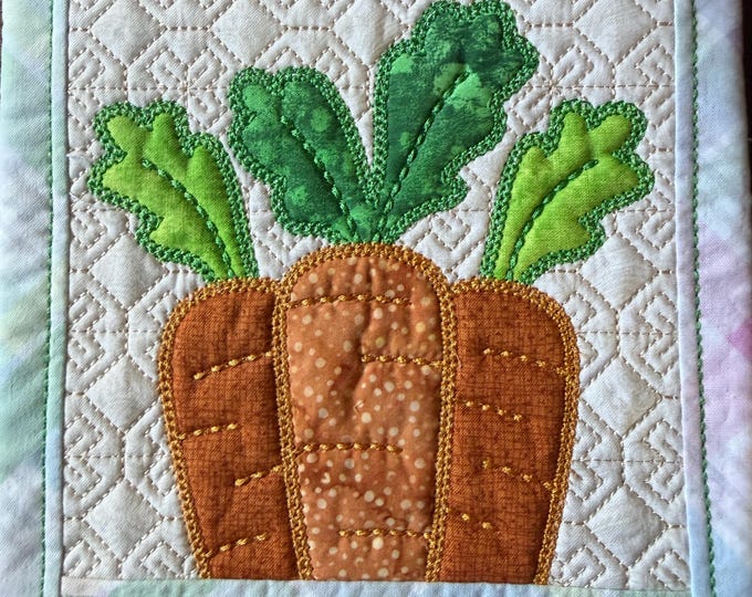 Easter Carrot Pot holder or Trivet.  Approximately 8 inches square.  Embroidered, Appliqued and quilted.