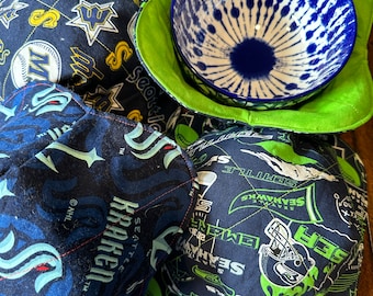 Bowl Cozy, Bowl Buddy.  Microwave Safe, Reversible, Northwest Sports.  Kraken, Seahawks and Mariners