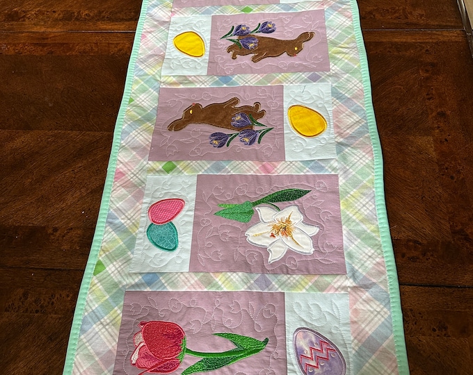 Easter Table Runner, Bunnies, Lilies, Tulips and Eggs.  Approximately 45 x 15 inches, ready to ship.  Quilted and Embroidered.