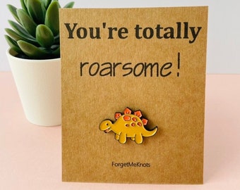 You’re totally roarsome! Dinosaur enamel pin. You are amazing. Appreciation gifts. Thank you gifts. Thoughtful, funny cards, dinosaur badges