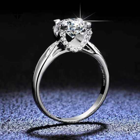 Floating setting hotsell engagement ring