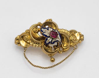 Biedermeier style brooch with garnet and enamel, Germany, circa 1850.