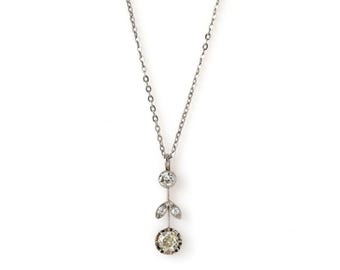 Platinum Art Nouveau pendant with diamonds, early 20th century.