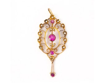 Old gold pendant with rubies and pearls