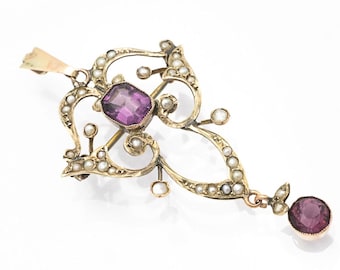 Art Nouveau brooch pendant with amethysts and pearls, England, circa 1900.