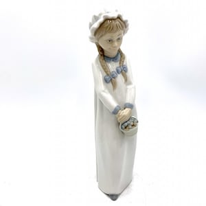 Statuina in porcellana raffigurante una ragazza con le trecce, Zaphir Lladro, Spagna, anni &#39;70