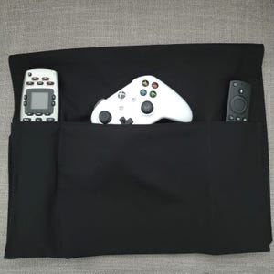Couch Caddy : télécommande et porte-livre avec poches