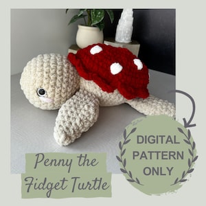 May include: A crocheted turtle toy named Penny the Fidget Turtle. The turtle is beige with a red shell with white polka dots. The image includes the text "Penny the Fidget Turtle" and "DIGITAL PATTERN ONLY".