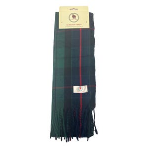 May include: A green, blue, and red plaid scarf with fringe. The scarf has a label that says "Morrison Green" and features a sheep logo.