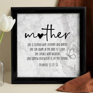 May include: A rustic wooden sign with the text "Welcome to our home" in white lettering. The sign features a distressed finish and a simple, inviting design, perfect for front door decor.