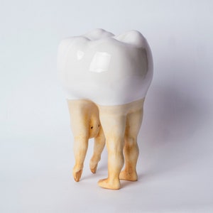 A Hand Crafted Ceramic Fun Tooth Human Figure Gift for a Dentist