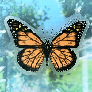 May include: A clear sticker with a monarch butterfly design and the text "You Have Value" in black lettering.