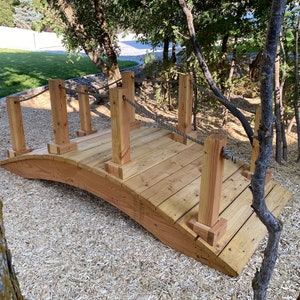 Arched Bridge with Rope Railing by Playscapes Studios