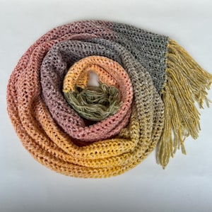 Knitted scarf for women with fringes. Knitted wool scarf with tweed effect. Knitted scarf for women with openwork pattern. Colorful striped scarf handmade