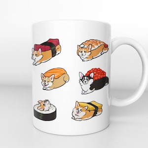 Könnte beinhalten: Eine weiße Keramiktasse mit einer bunten Illustration von Corgis, die als verschiedene Sushi-Sorten verkleidet sind. Die Corgis tragen verschiedene Sushi-Beläge, darunter Lachs, Thunfisch und Avocado.