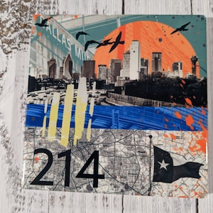 May include: A colorful collage featuring a cityscape with skyscrapers, a highway, and a sunset. The text "Dallas Market" is visible in the upper left corner. The number "214" is in the lower left corner. A Texas flag is in the lower right corner.