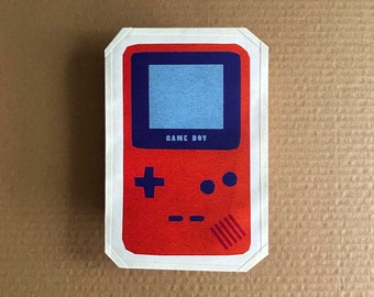 Gameboy rouge - enveloppe cadeau faite main / boulette en papier (enveloppe cadeau, pochette en papier, enveloppe porte-bonheur qui sert également de carte de voeux)