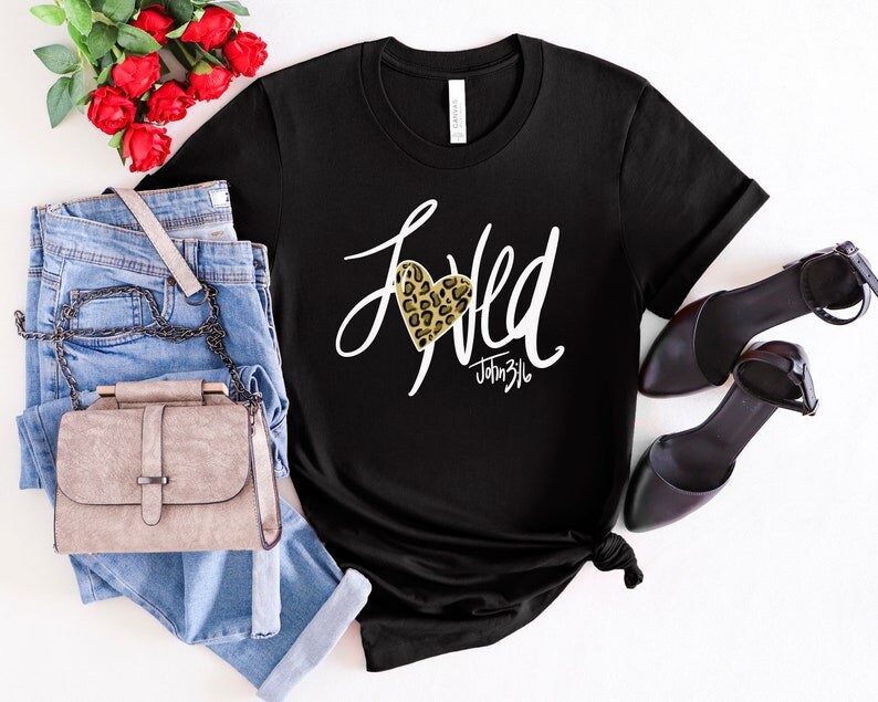 May include: Black t-shirt with a white graphic that says "Loved" with a leopard print heart and the text "John 3:16".