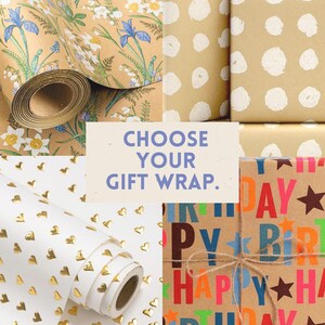 May include: A collage of gift wrap options. Floral paper with blue irises and white flowers, dot-patterned paper, white paper with gold hearts, and a birthday-themed wrap with colorful text and stars. The text "CHOOSE YOUR GIFT WRAP" is also present.