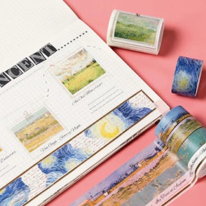 May include: Assortment of washi tape rolls featuring famous Vincent van Gogh paintings. The rolls include "Starry Night", "Wheatfield with Crows", and "Sunflowers".