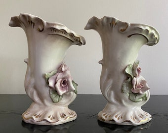 Pair of vintage off white cornucopia vases with appliqué pink roses and gold trim