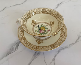Vintage Mintons "English Rose" teacup and saucer with colorful floral bouquet and ornate light brown trim, Made in England