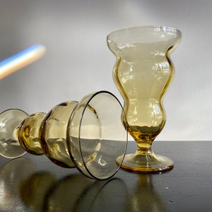 Pair of vintage yellow glass vases