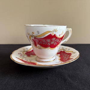 Vintage Sutherland bone china teacup, Red and yellow scroll with flower design, Staffordshire England