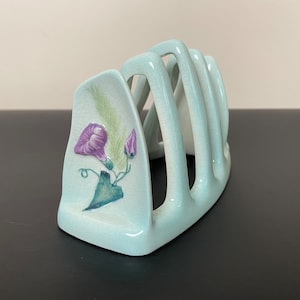 Vintage Carlton Ware light blue hand painted ceramic toast rack with raised purple morning glory detail, Made in England