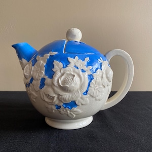 Vintage/antique Moriyama Mori-machi hand painted blue and white teapot with raised floral design, Made in Japan