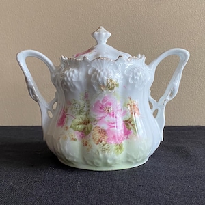 Vintage/Antique porcelain two handled sugar bowl with lid & pink floral design, unmarked