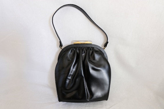 60s black top handle tote bag with clasp closure