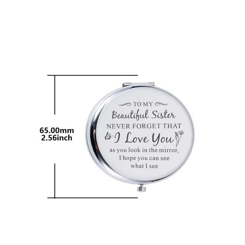 May include: A silver compact mirror with a message that reads "To my Beautiful Sister Never Forget That I Love You as you look in the mirror, I hope you can see what I see". The mirror is 2.56 inches in diameter.