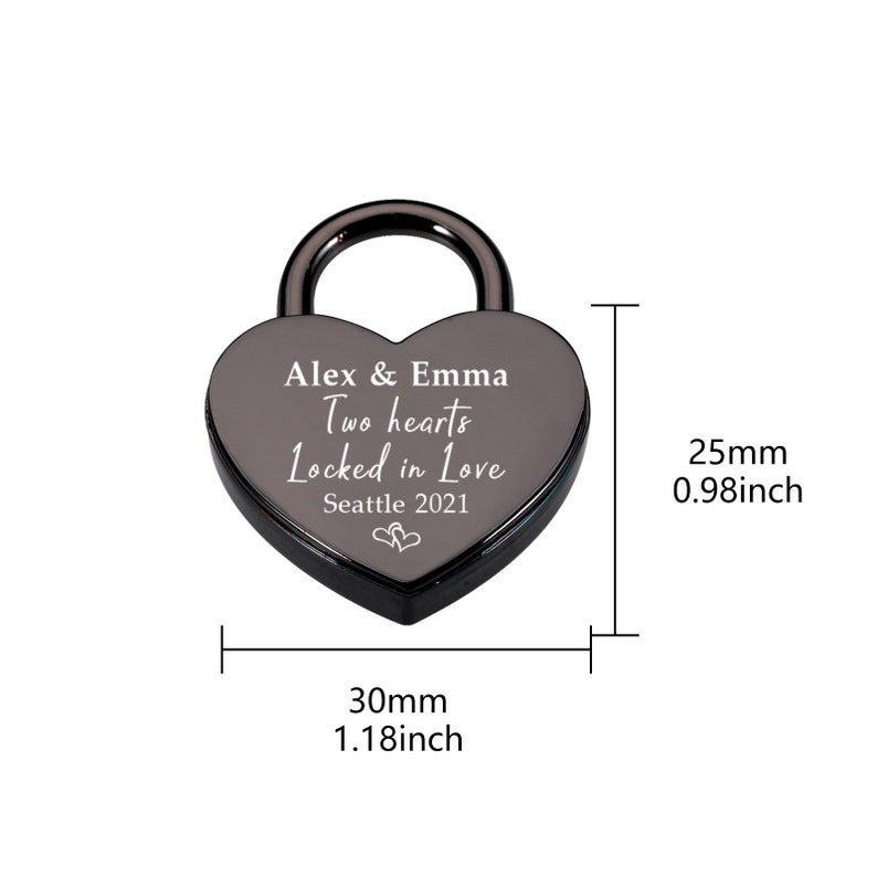 May include: Black heart-shaped padlock with the inscription "Alex & Emma Two hearts Locked in Love Seattle 2021". The padlock measures 1.18 inches wide and 0.98 inches tall.