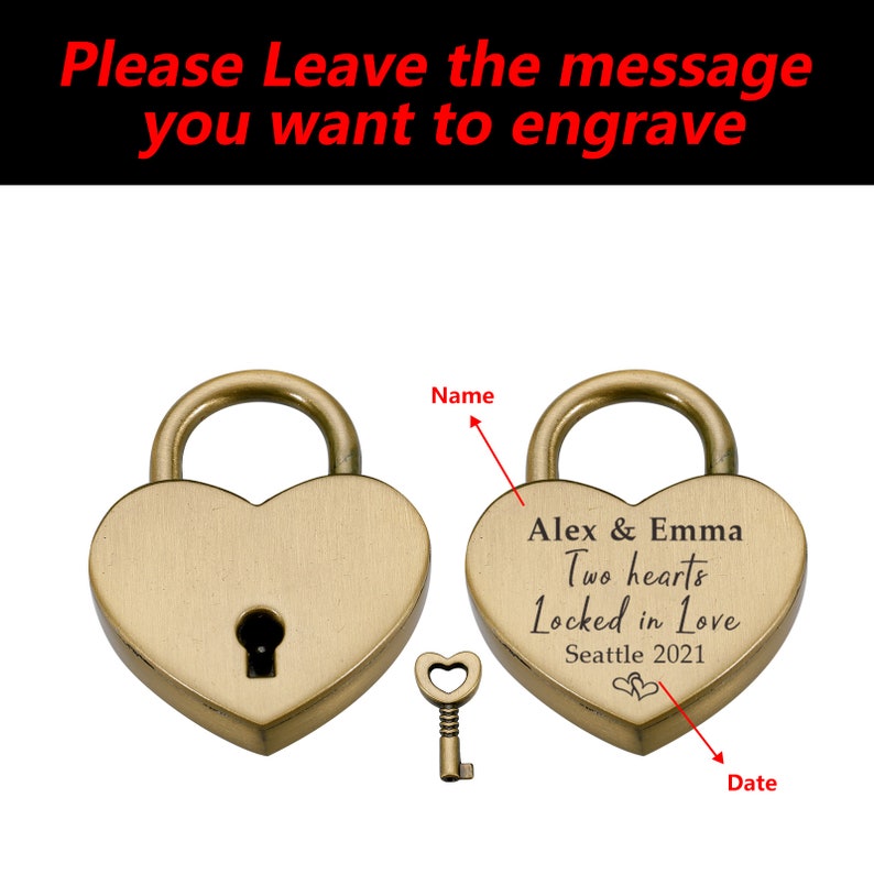May include: A gold heart-shaped padlock with a key. The padlock has an inscription that reads "Alex & Emma Two hearts Locked in Love Seattle 2021".