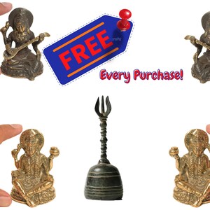 May include: Four small brass statues of a Hindu deity playing a musical instrument, a bell with a trident handle, and a sign that says "FREE Every Purchase!"