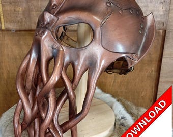 May include: A copper-coloured leather mask with a detailed design of an octopus head. The mask has a textured surface and a series of tentacles extending from the bottom. The mask is displayed on a wooden stand. DIGITAL DOWNLOAD PDF